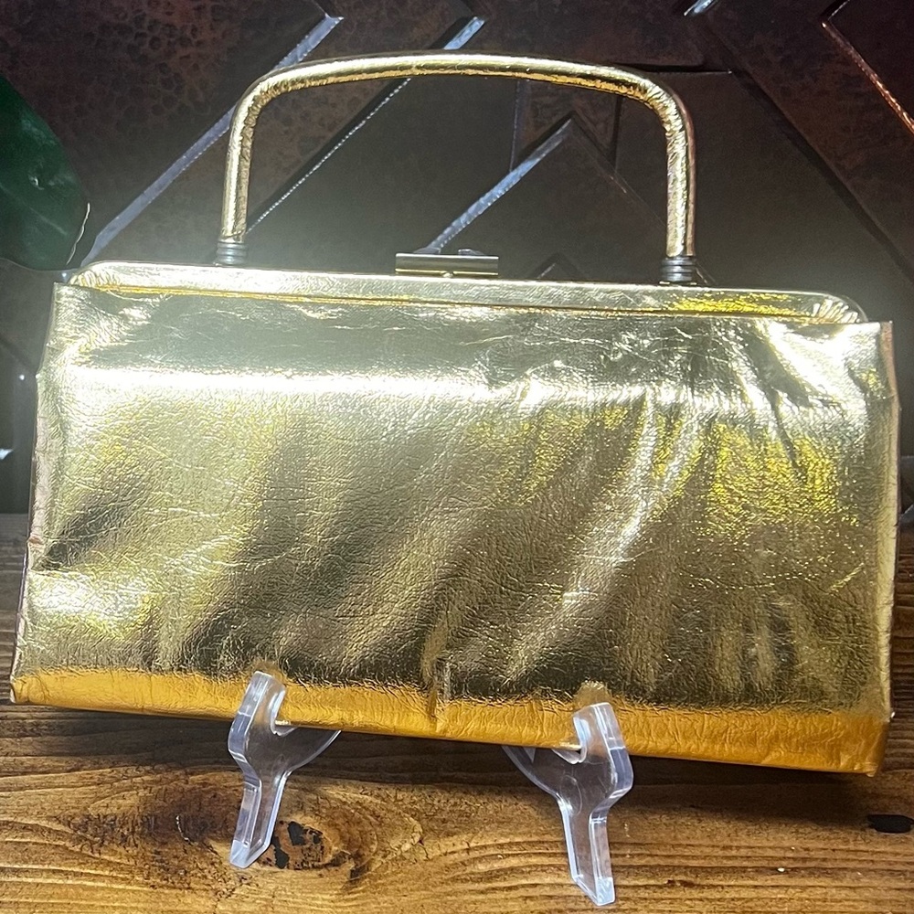 Elegant Vintage Metallic Gold Women's Clutch Purse from the 1960s-1970s